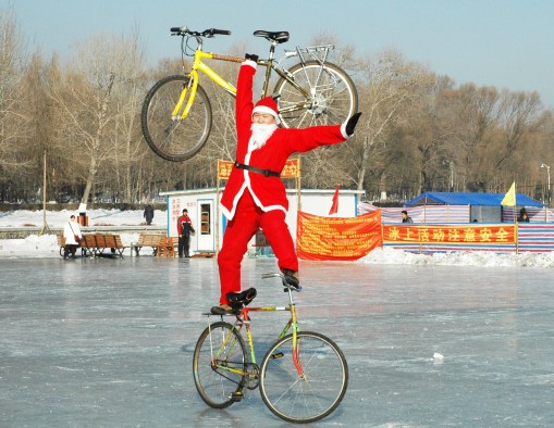 (2)CHINA-CHANGCHUN-SANTA CLAUS-BIKE STUNT (CN)